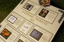 A close up view of a cream Tribleau showing the Tribute Cards created by mourners on www.agivingtribute.com